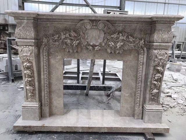 Carved Rose Marble Fireplace